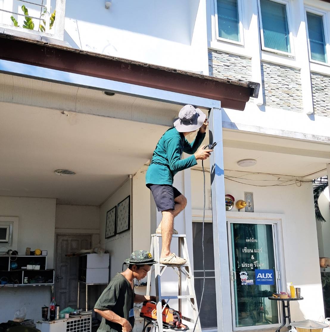งานโครงสร้างและต่อเติมบ้าน - งานต่อเติมหลังคาโรงรถ
