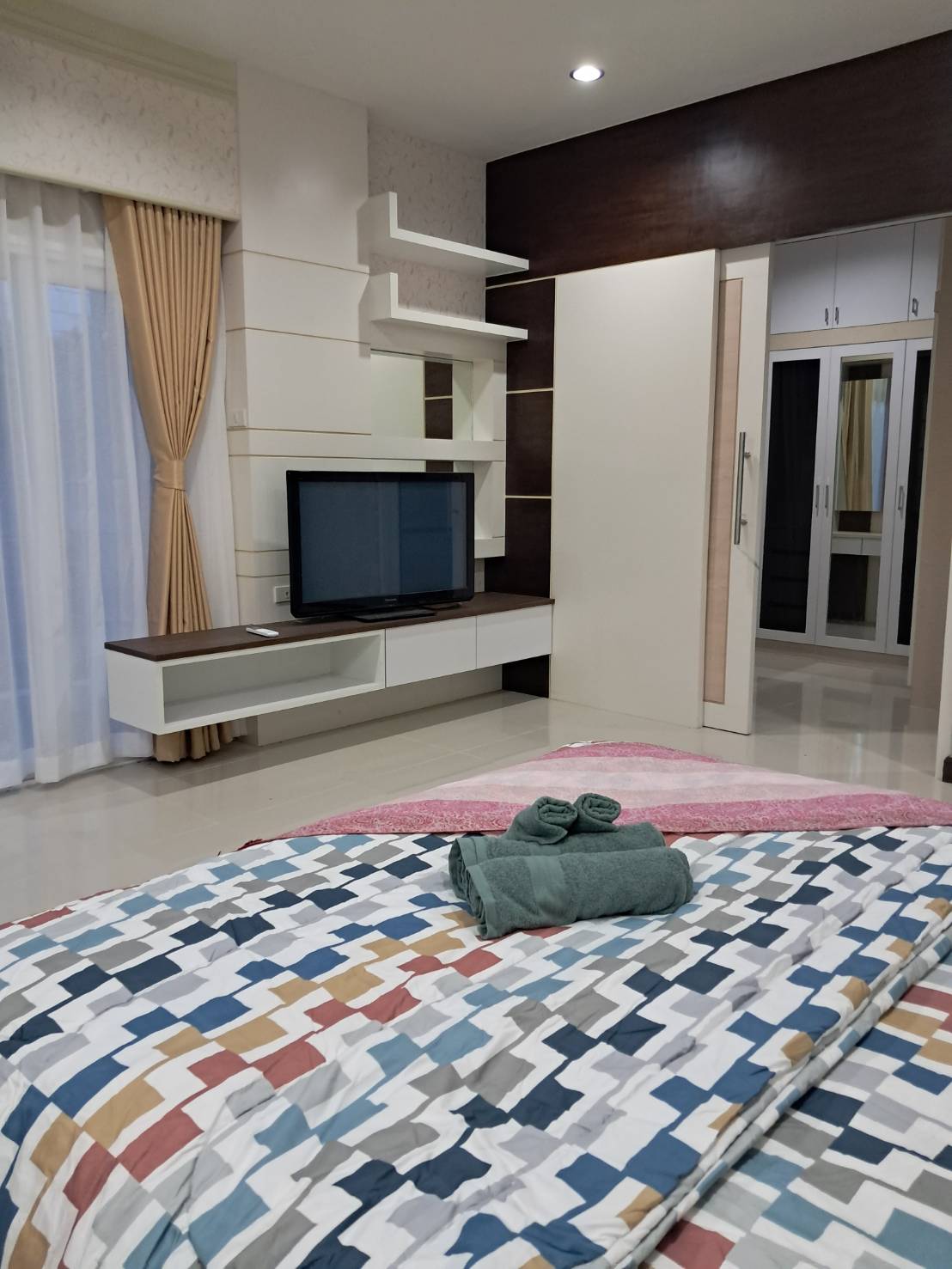 Bedroom 1 with 1 King-size bed & Air Conditioning