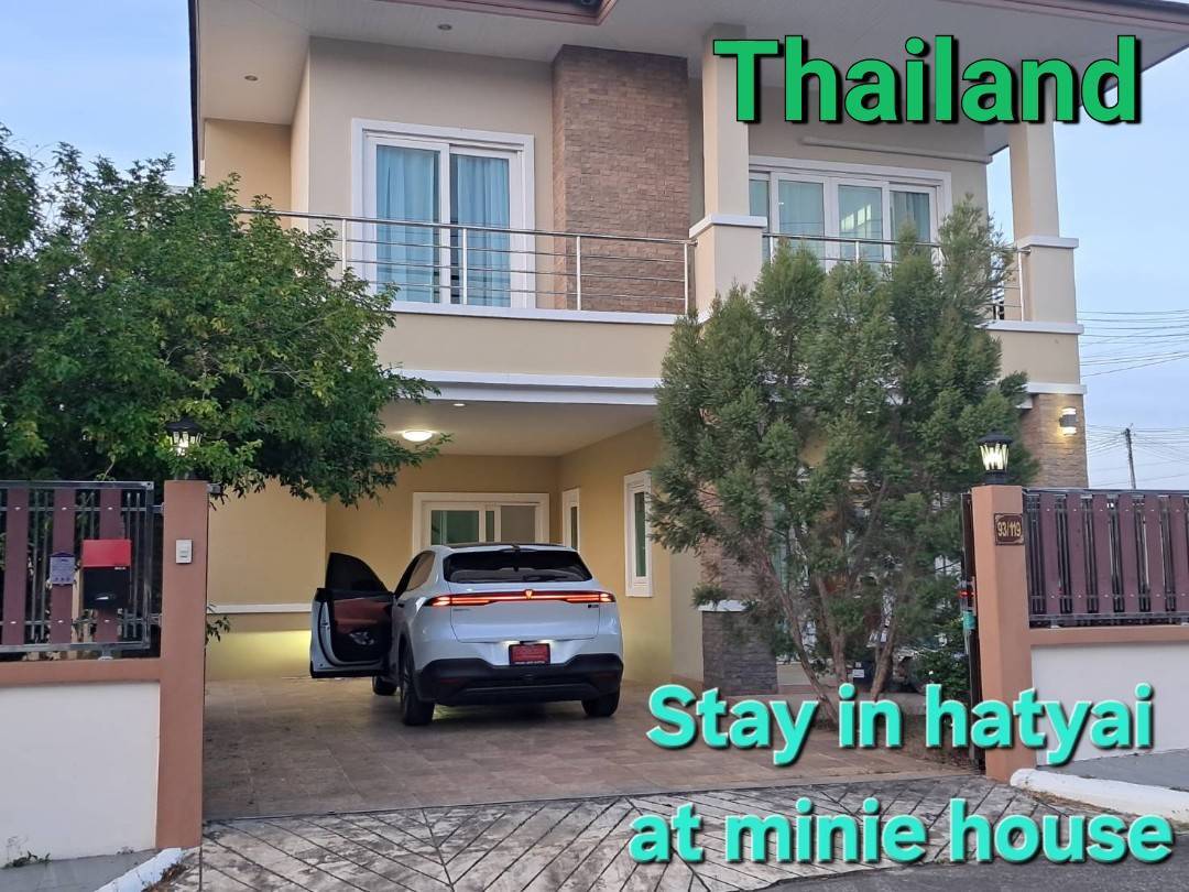 Private parking area and house entrance